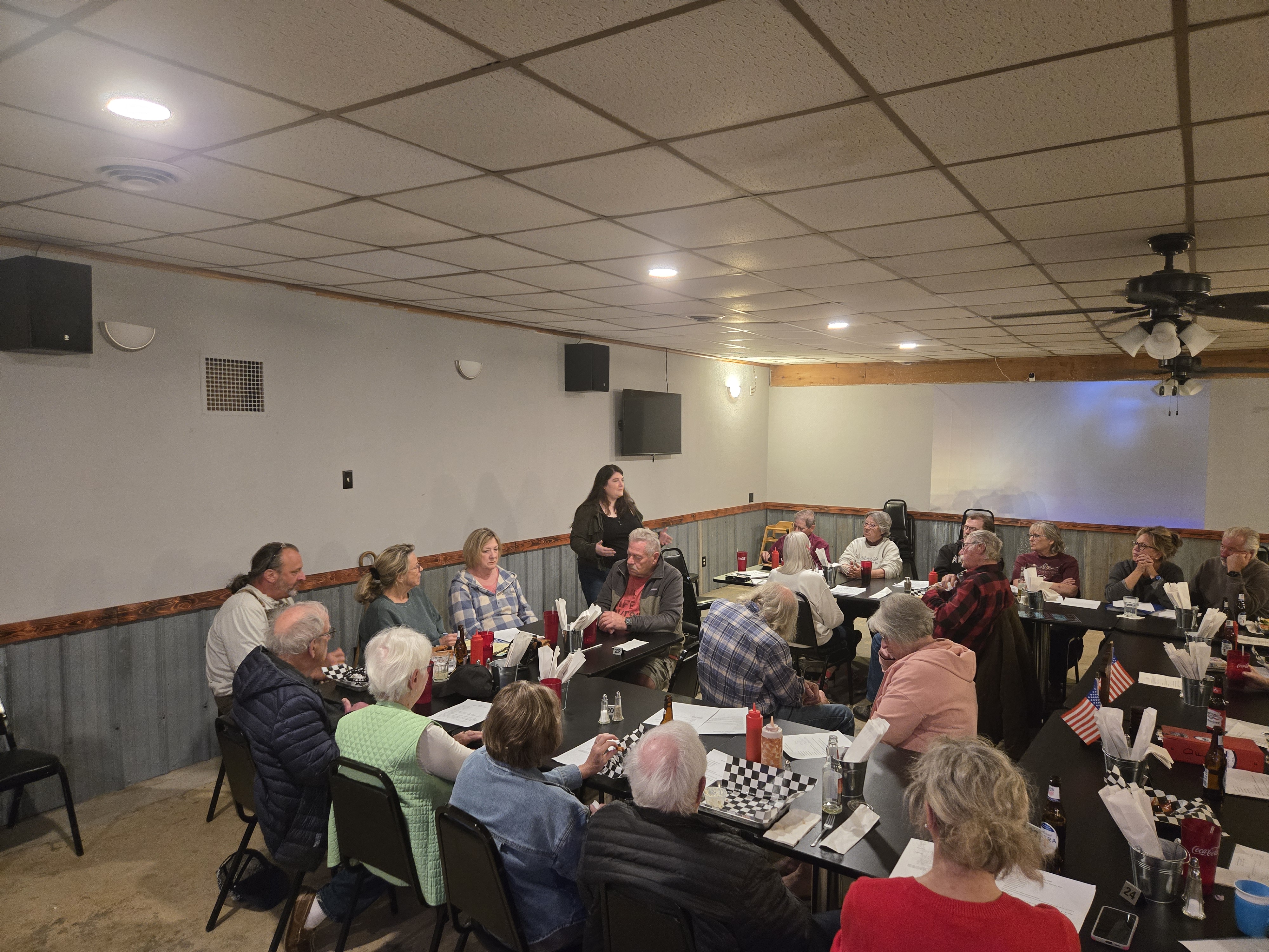 Caitlyn speaking at a community event
